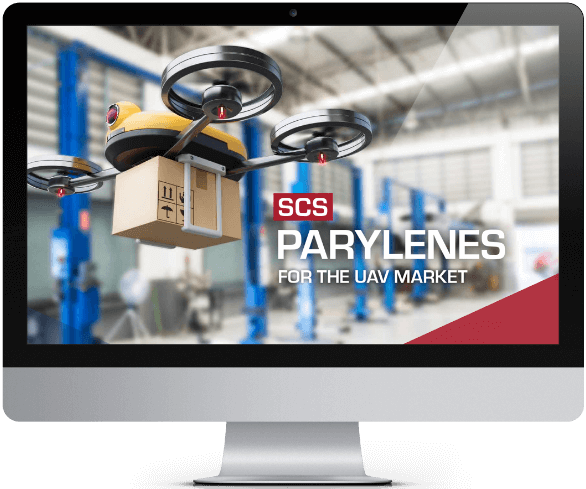 A computer screen shows an SCS e-book cover featuring a UAV carrying a package, promoting lightweight Parylene coatings for UAVs.